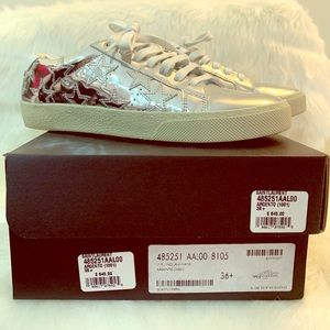 Saint Laurent court classic star low top sneakers.